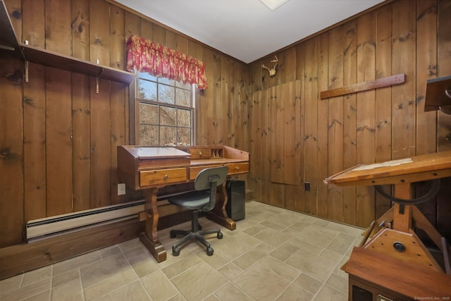 home office featuring baseboard heating and wood walls