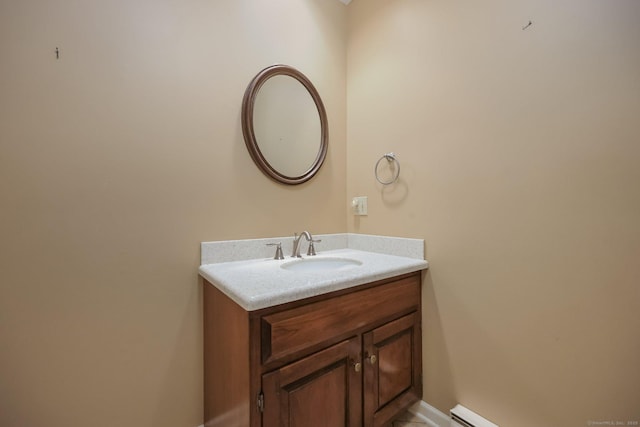 bathroom featuring vanity and a baseboard radiator