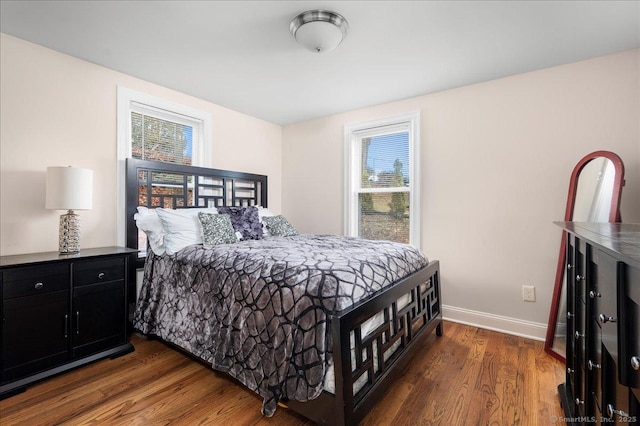 bedroom featuring dark wood-type flooring