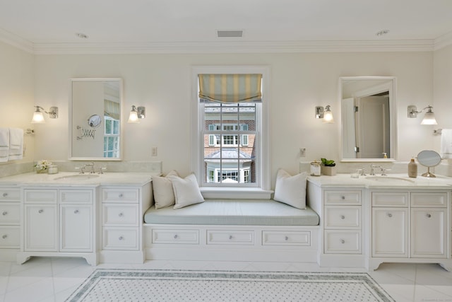 bathroom featuring vanity, ornamental molding, and tile patterned flooring