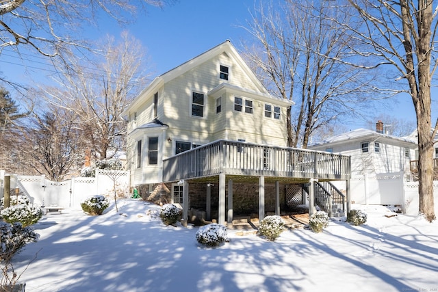 view of front of home with a wooden deck