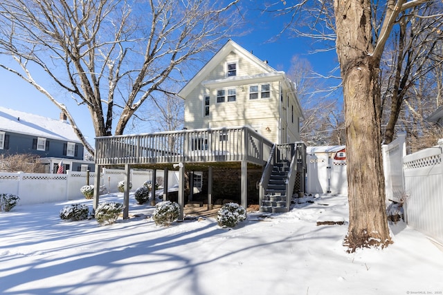 view of front of home with a wooden deck