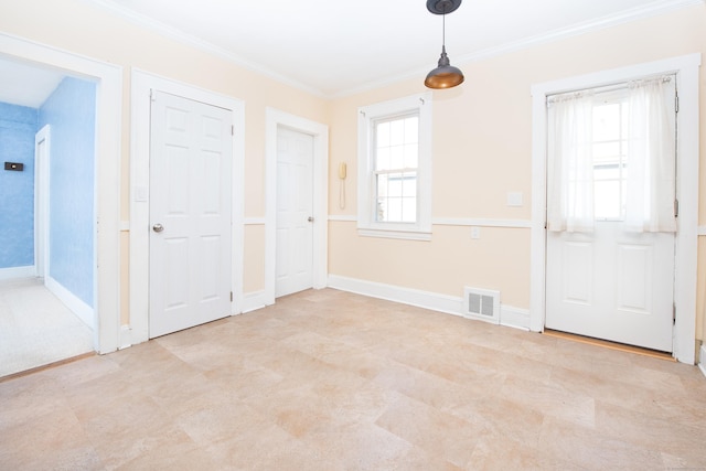 unfurnished bedroom featuring crown molding