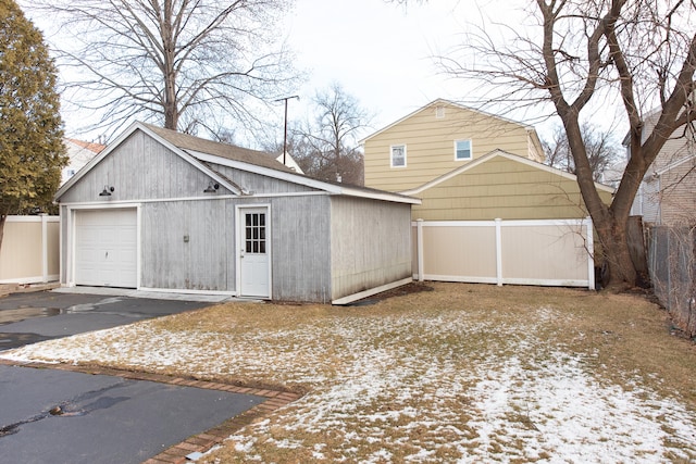 view of snow covered garage