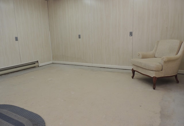 living area with baseboard heating