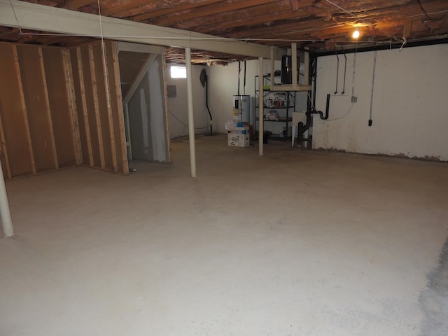 basement featuring electric water heater