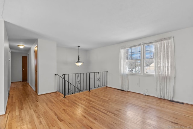 empty room featuring light wood-type flooring