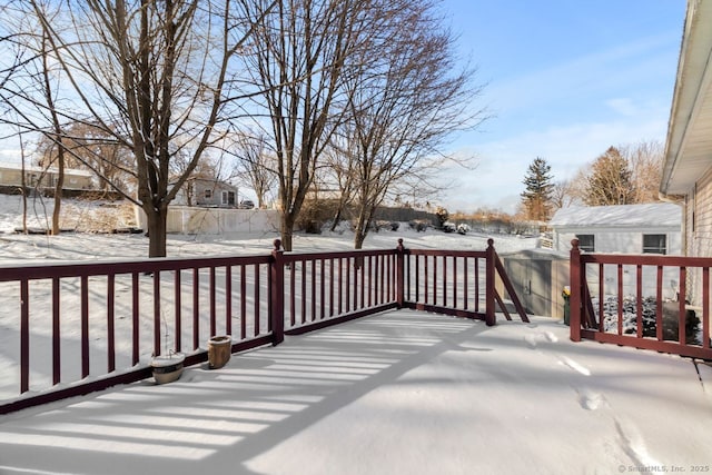 view of snow covered deck