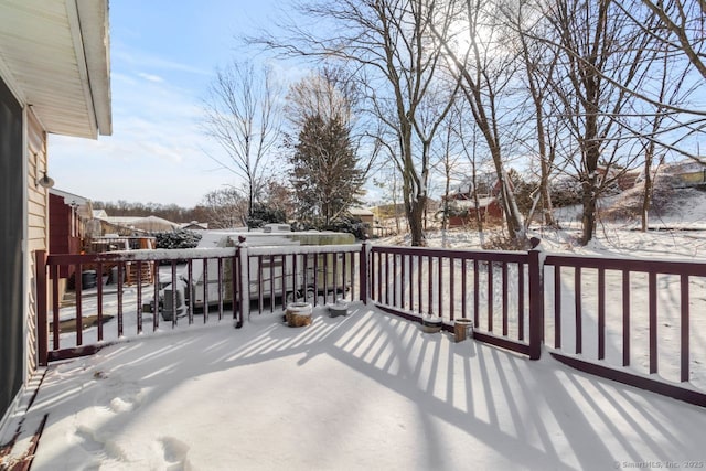 view of snow covered deck