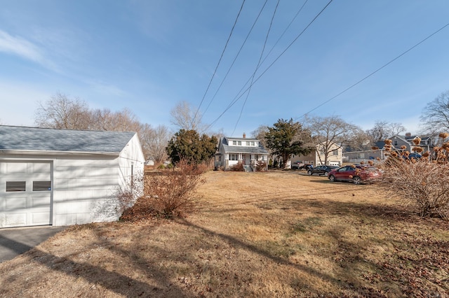 view of yard featuring a garage