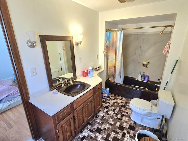 full bathroom with toilet, shower / bathtub combination with curtain, hardwood / wood-style flooring, and vanity