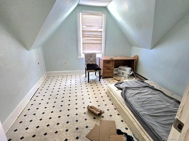 bedroom with vaulted ceiling