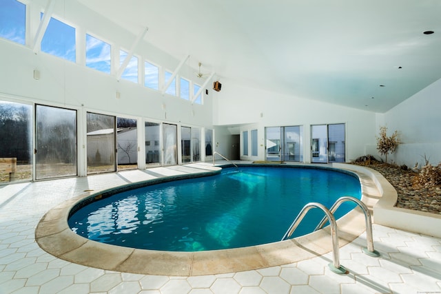 view of swimming pool with a jacuzzi