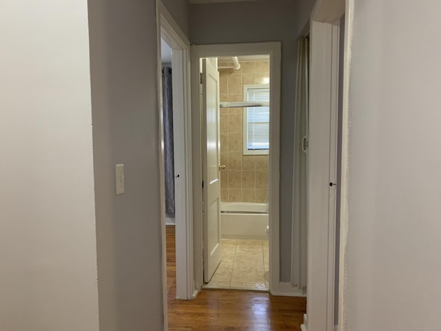 corridor featuring hardwood / wood-style flooring