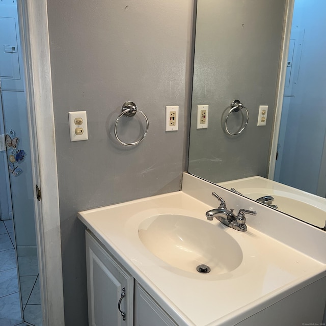 bathroom with vanity and tile patterned floors