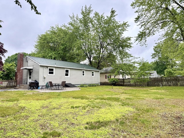13 Lancer Dr, Enfield, CT 06082 - rear view of property with a patio area and a shingled roof