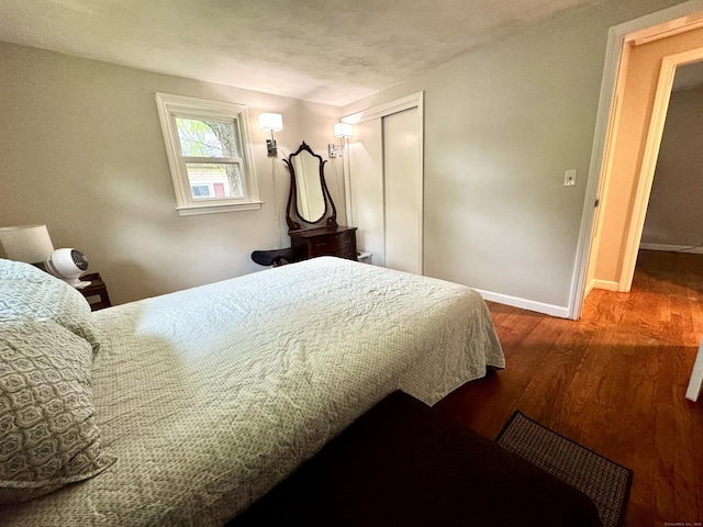 13 Lancer Dr, Enfield, CT 06082 - bedroom featuring wood finished floors, a closet, and baseboards