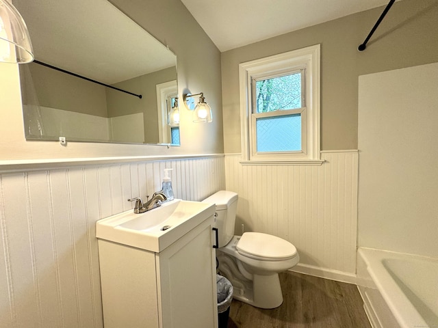 13 Lancer Dr, Enfield, CT 06082 - full bathroom featuring a wainscoted wall, vanity, toilet, and wood finished floors