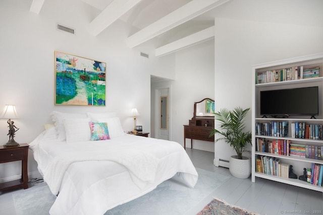 bedroom featuring a baseboard heating unit and beam ceiling