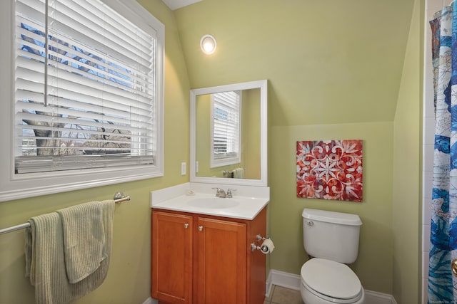 bathroom featuring lofted ceiling, tile patterned flooring, vanity, a shower with curtain, and toilet