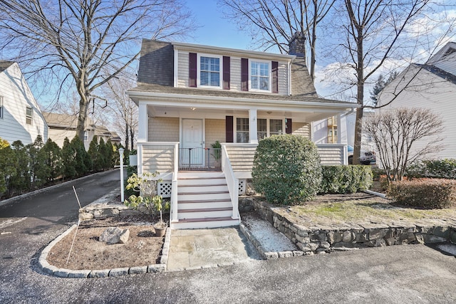 view of front of house featuring covered porch