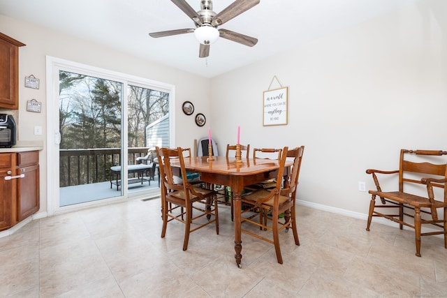 dining area featuring ceiling fan