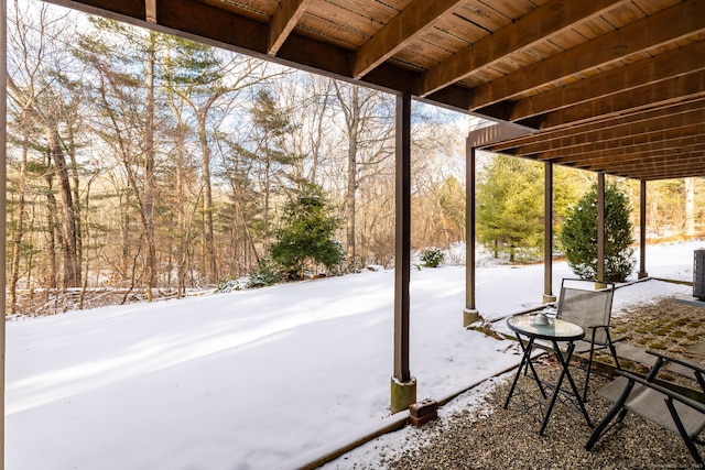 view of snow covered patio