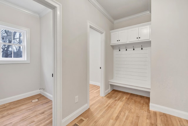 mudroom featuring light hardwood / wood-style flooring and crown molding