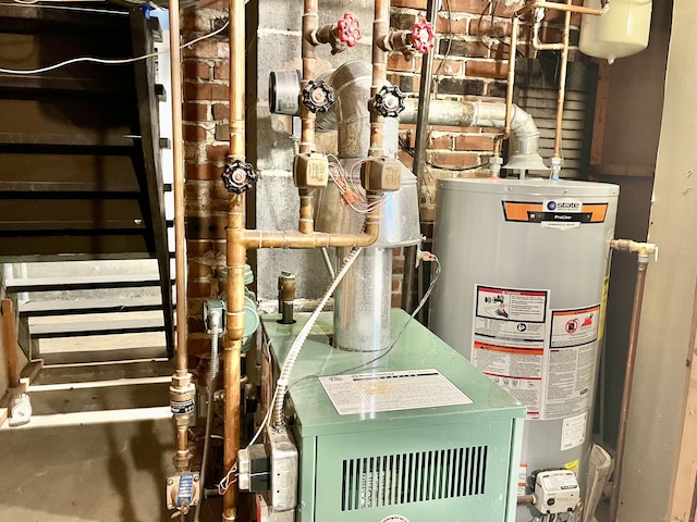 utility room featuring gas water heater