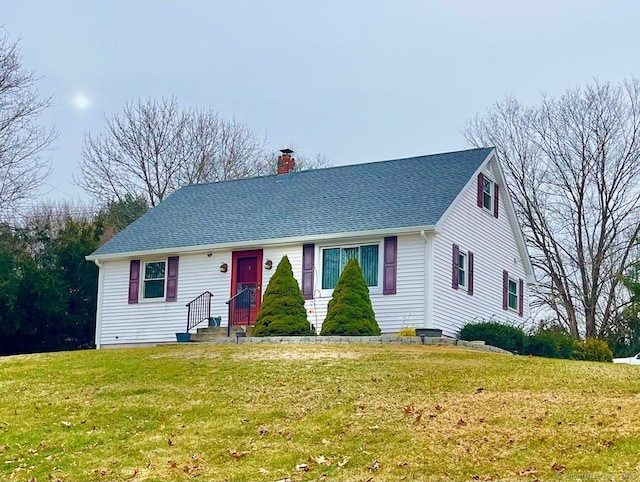 view of front of house with a front lawn