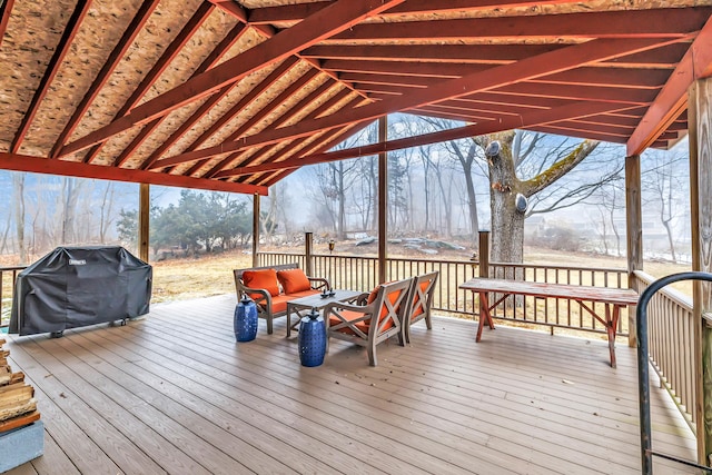 deck with an outdoor living space and grilling area