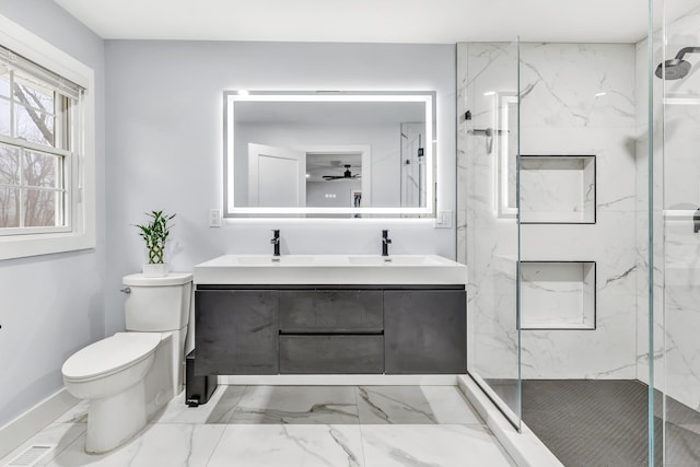 bathroom with vanity, walk in shower, and toilet