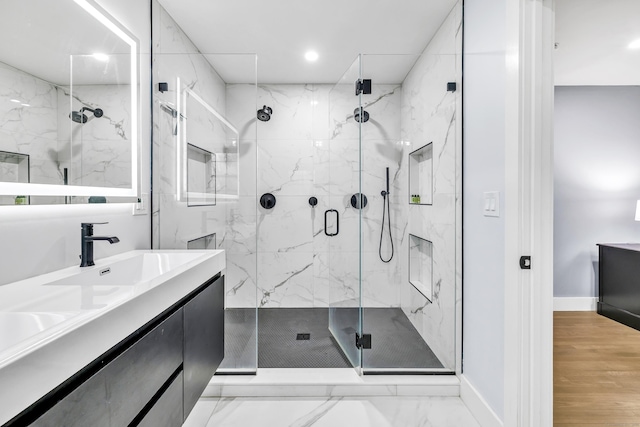 bathroom with vanity and walk in shower