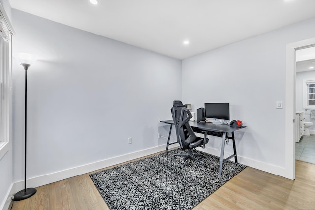 home office featuring hardwood / wood-style flooring