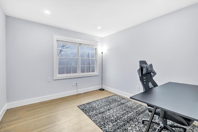 office with hardwood / wood-style floors