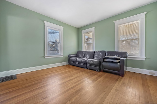 living room with light hardwood / wood-style floors