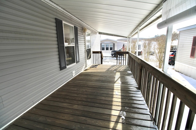 view of snow covered deck