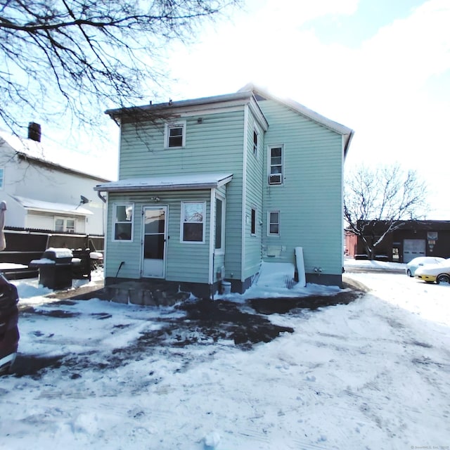 view of snow covered property