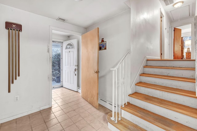 view of tiled foyer entrance