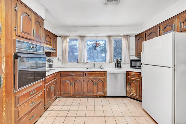 kitchen with sink and black appliances