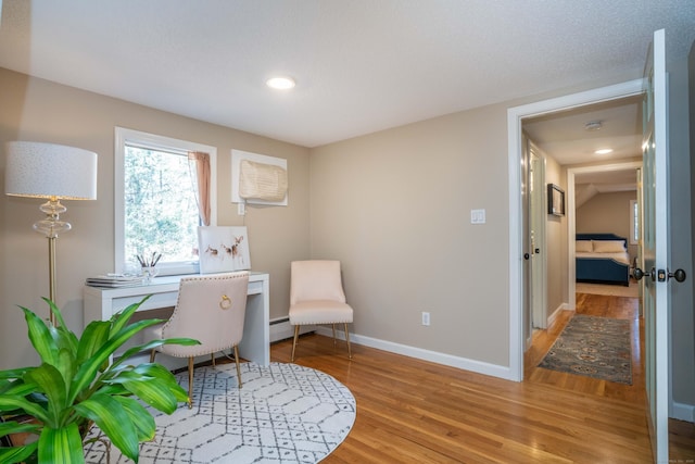 home office with light wood-type flooring