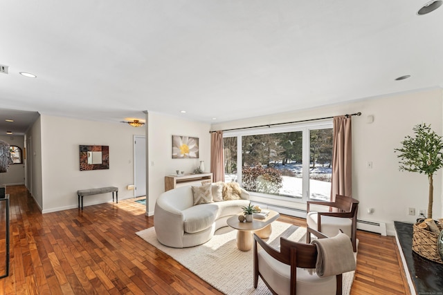 living room with a baseboard radiator and dark hardwood / wood-style floors