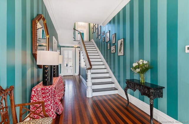 114 Walkley Hill Rd, Haddam, CT 06438 - entryway with wallpapered walls, stairs, wood finished floors, and ornamental molding