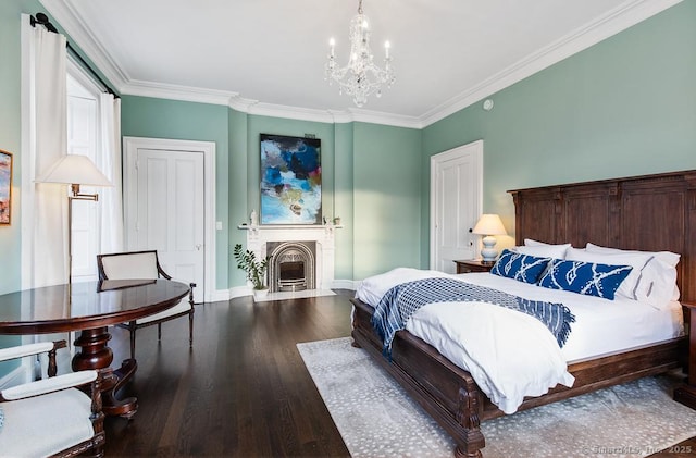 114 Walkley Hill Rd, Haddam, CT 06438 - bedroom featuring a chandelier, wood finished floors, ornamental molding, and a fireplace with flush hearth