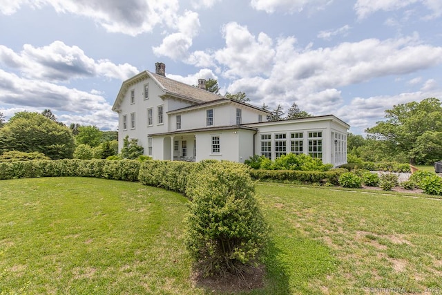 114 Walkley Hill Rd, Haddam, CT 06438 - rear view of property featuring a yard, stucco siding, and a chimney