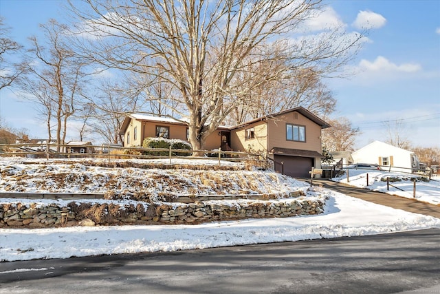 view of front of home with a garage