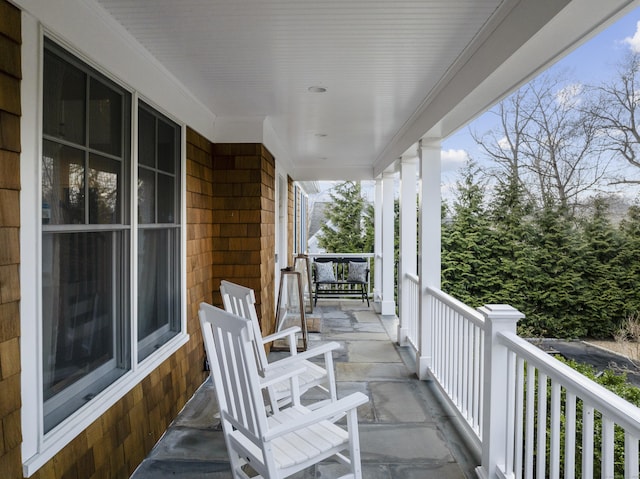 balcony featuring covered porch