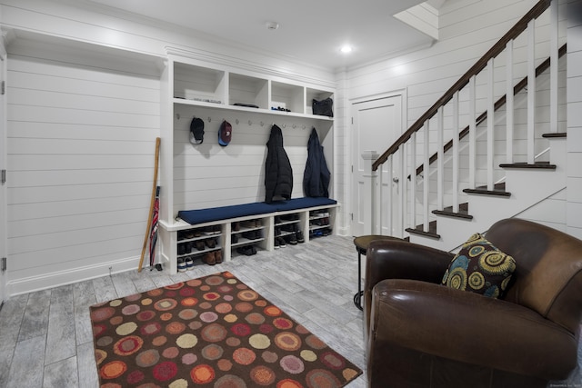 mudroom with hardwood / wood-style flooring and ornamental molding