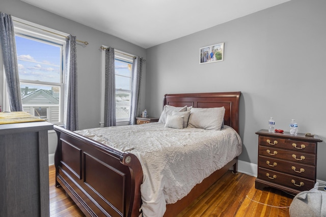 bedroom featuring dark wood-type flooring