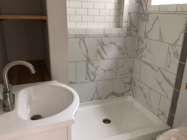 111 Pineville Rd, Killingly, CT 06241 - bathroom featuring a sink and a stall shower
